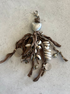 Heart cowrie tassel
