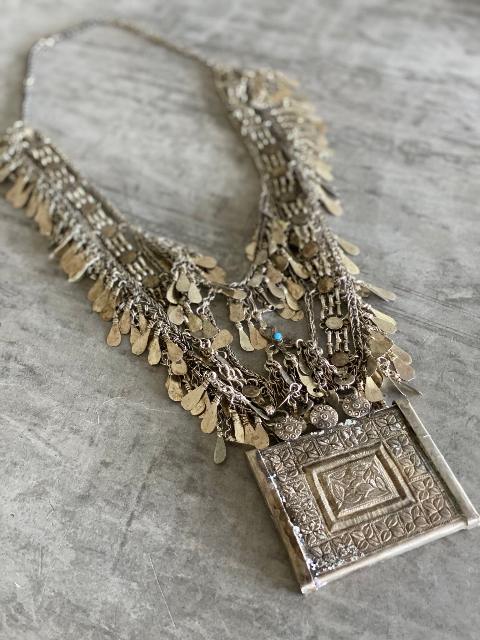 Longline fringe amulet necklace