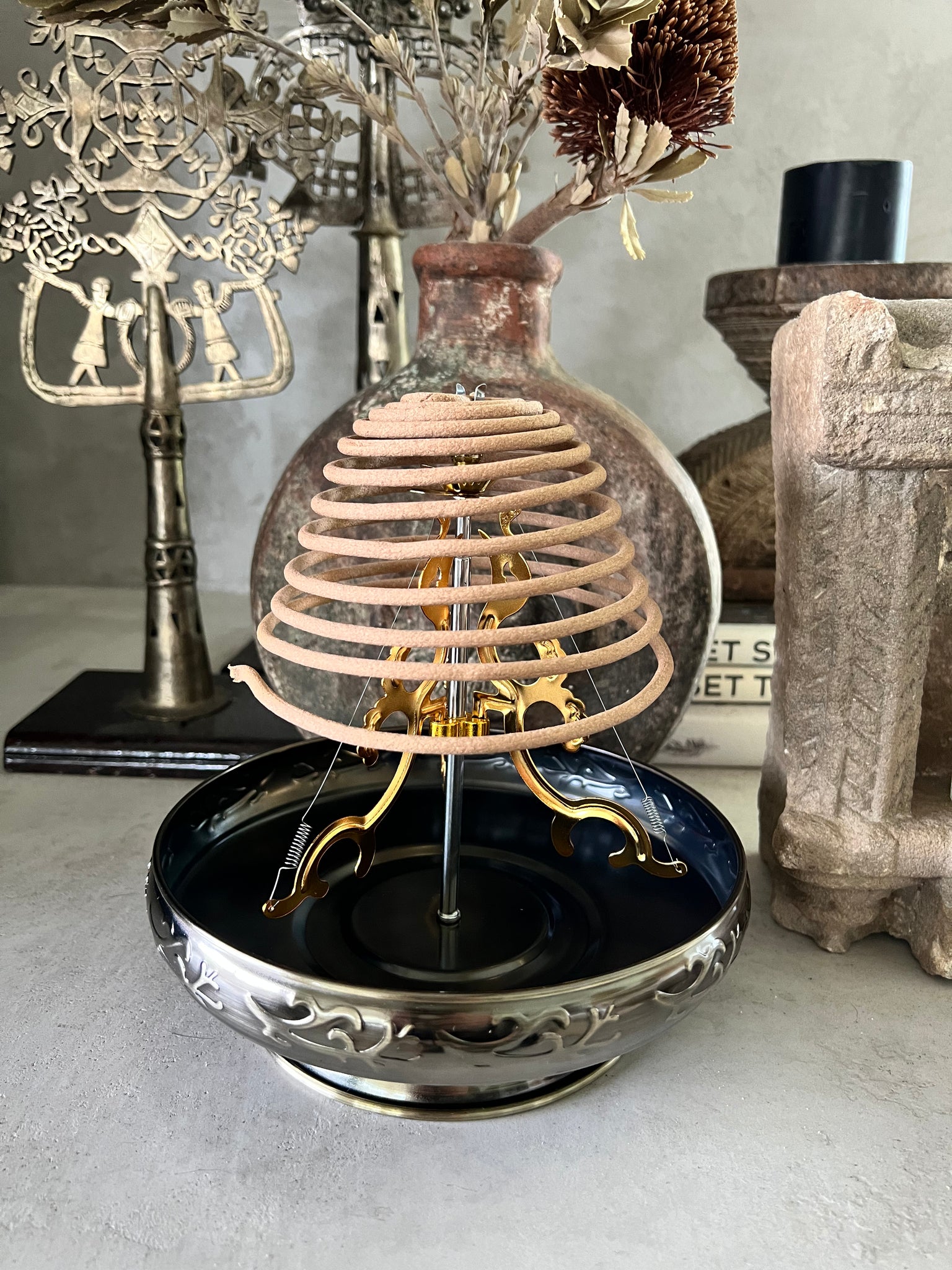 Traditional coil incense holder